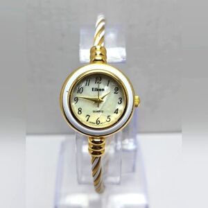 Womens Eikon CB-01 White Enamel Gold Tone Wire Cuff Watch New Battery Bangle